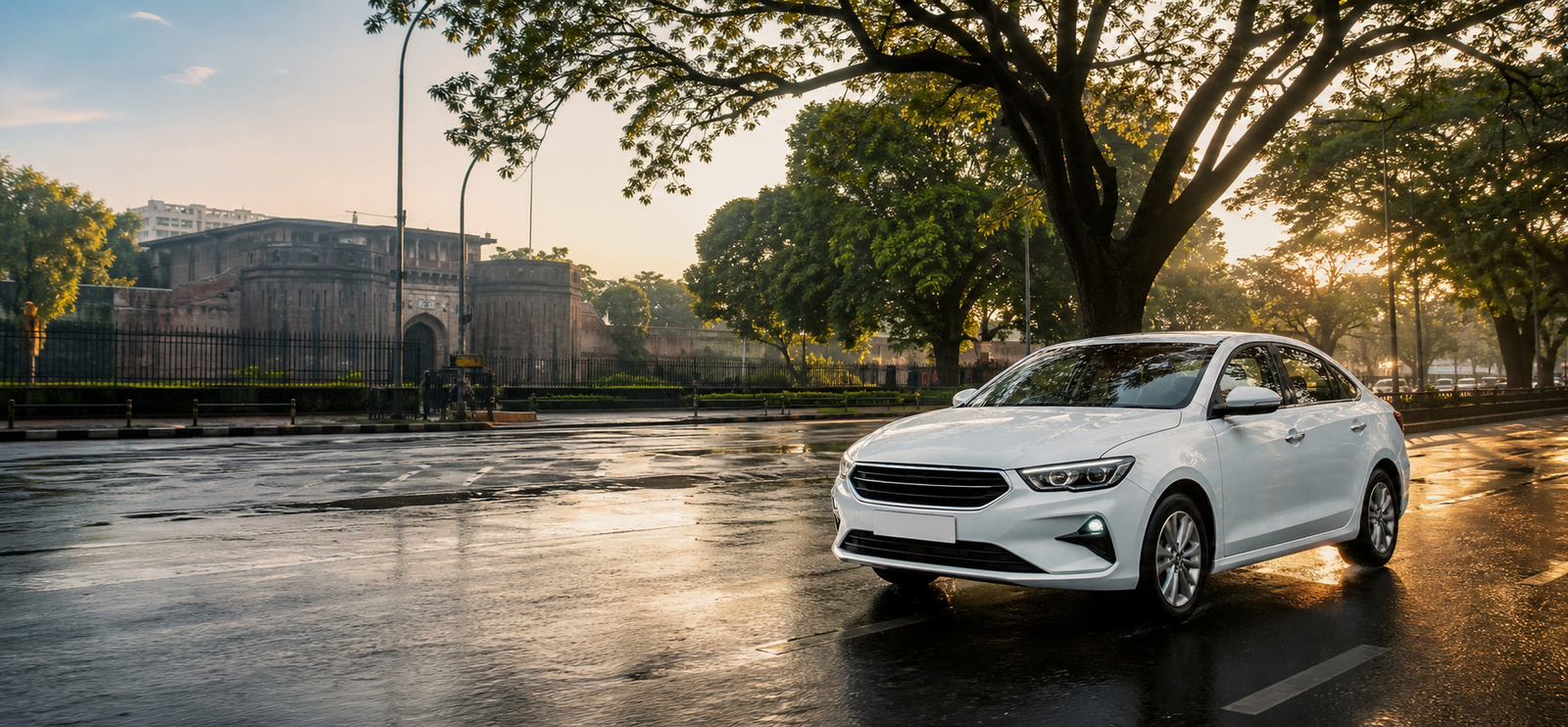 A white cab driving near Shaniwar Wada in Pune at sunrise